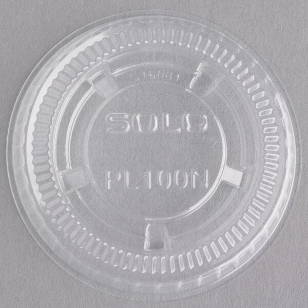 Dart PL100N - 1oz PET Plastic Soufflé Cup Lid, Clear - Case of 2500