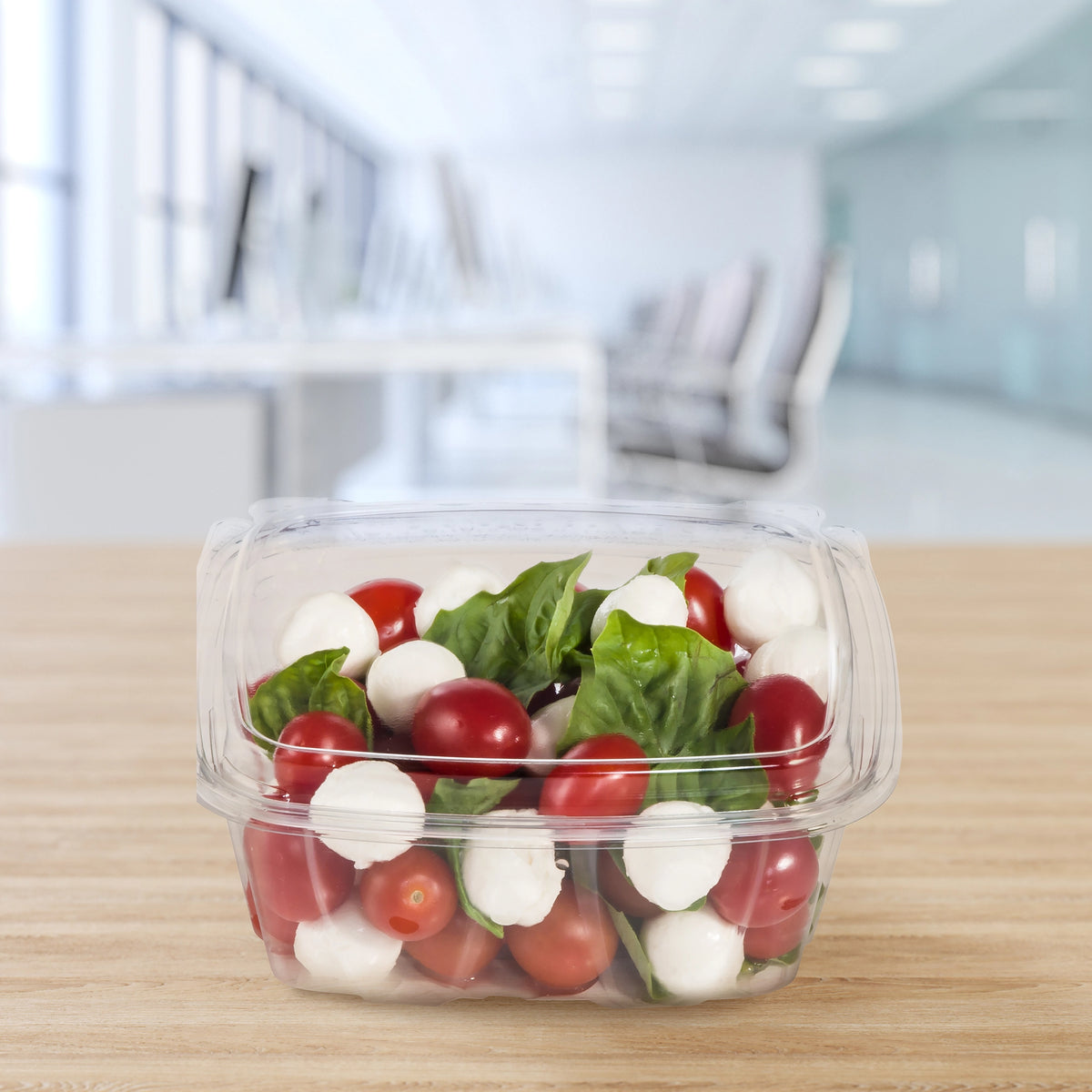 Dart CH32DED SafeSeal container holding tomato and mozzarella salad