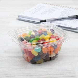 Dart CH4DEF SafeSeal container holding jelly beans on a table