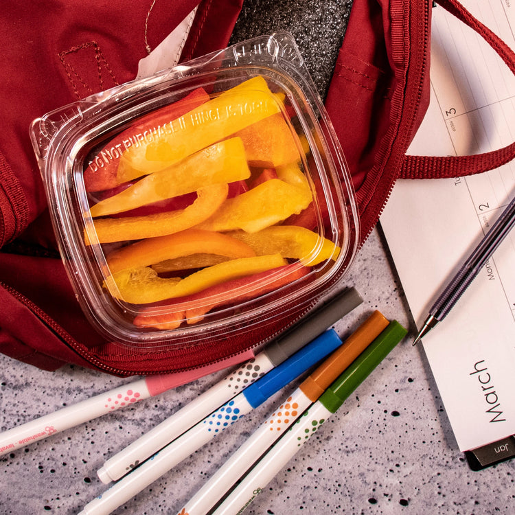 Dart CH8DED SafeSeal dome-lid container holding bell pepper strips in a red backpack
