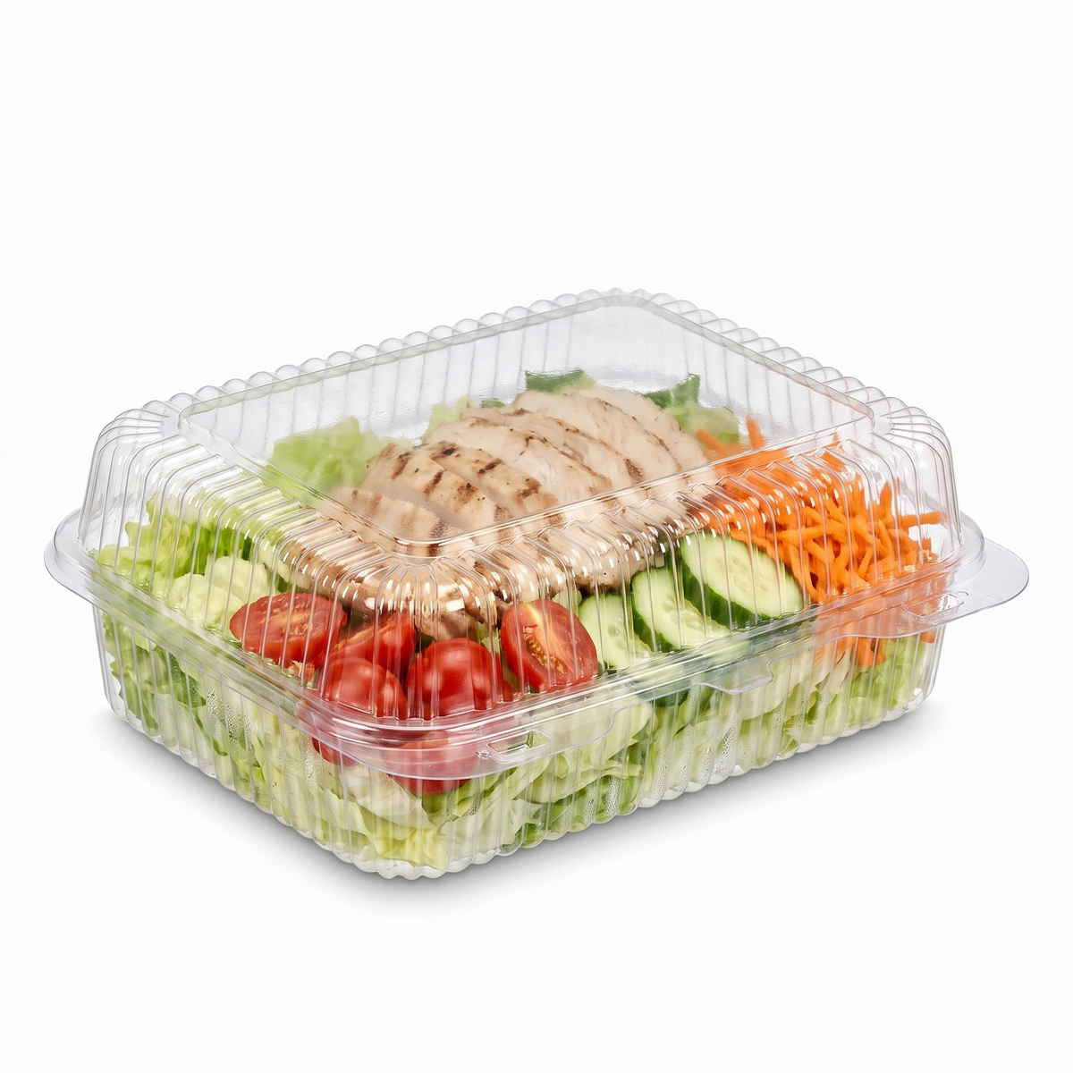 Inline Plastics Essentials SLP40 73.3 oz. dome-lid container filled with a cold chicken and mixed green salad