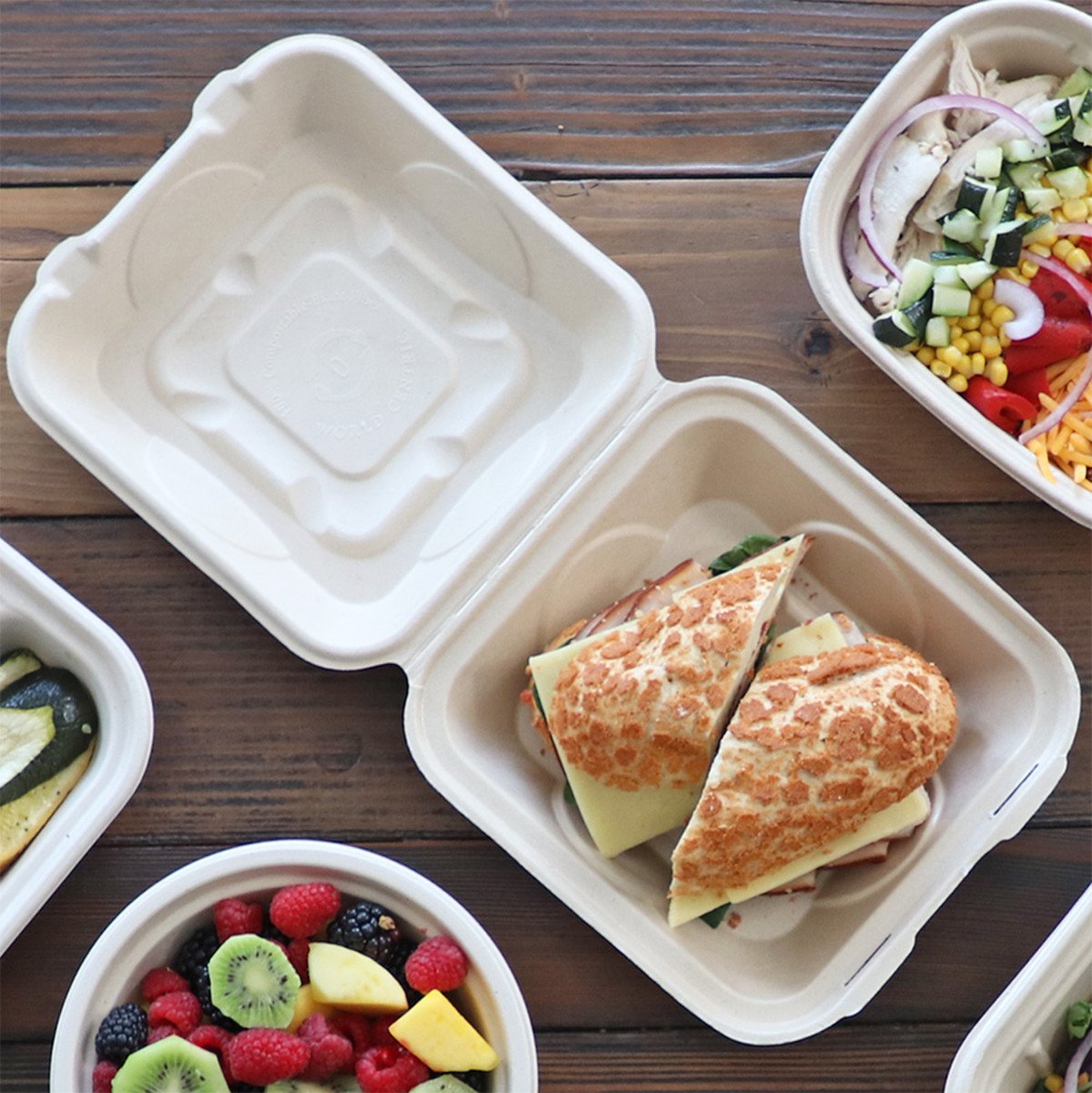 World Centric TO-SC-U85-3-LFP 8 x 8 x 3 inch compostable fiber takeout clamshell