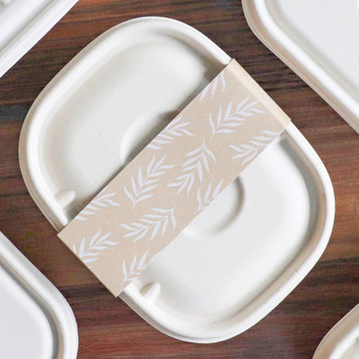 World Centric SL-PA-CT2 paper sleeve securing a compatible fiber takeout box