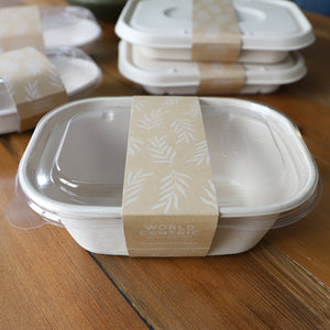 World Centric SL-PA-CT3 paper sleeve securing a compatible 48 oz takeout box