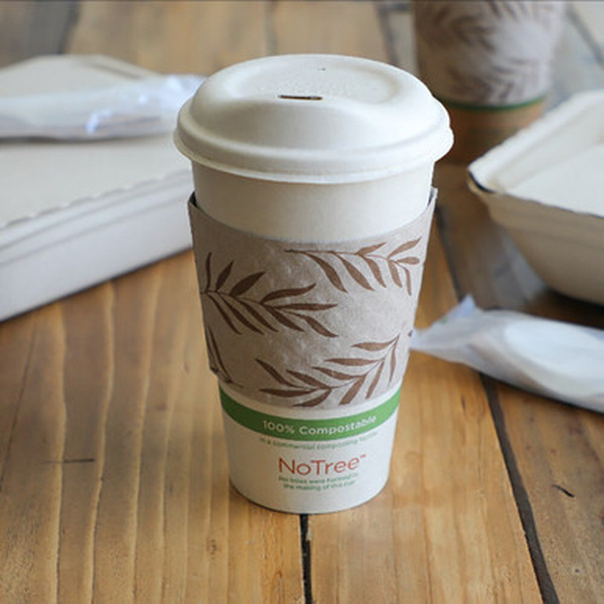 World Centric SL-PA-LG recycled paper sleeve fitted on a hot beverage cup