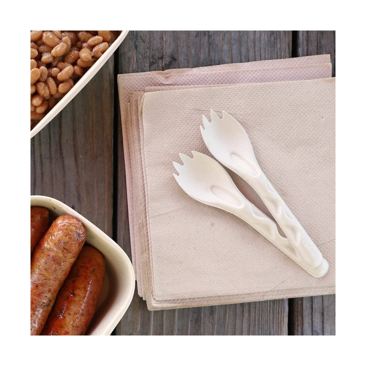 World Centric 6-inch plant-fiber sporks in a foodservice tabletop setting