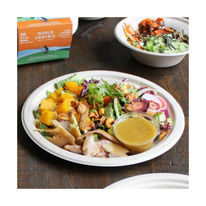World Centric 9-inch plant-fiber plate serving a prepared salad