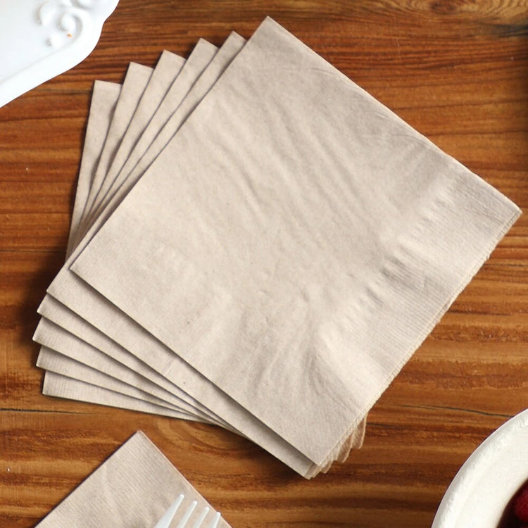 World Centric unbleached beverage napkins arranged for café service