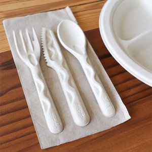 World Centric fiber knife with matching fiber cutlery at a compostable place setting